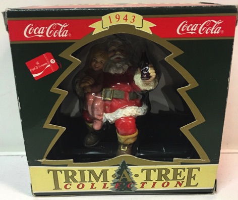 45109-3 € 10,00 coca cola ornament kerstman met kind (1x zonder doosje)